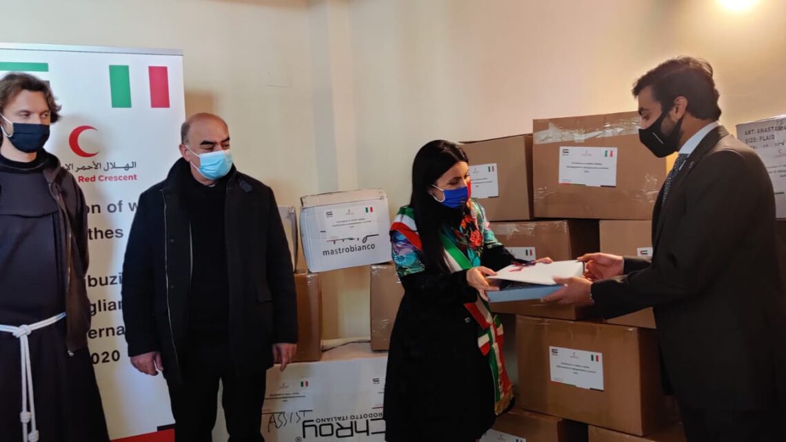 DAGLI EMIRATI ARABI UNITI  IN REGALO CAPI  DI ABBIGLIAMENTO INVERNALE  PER LE FAMIGLIE PIU’ BISOGNOSE